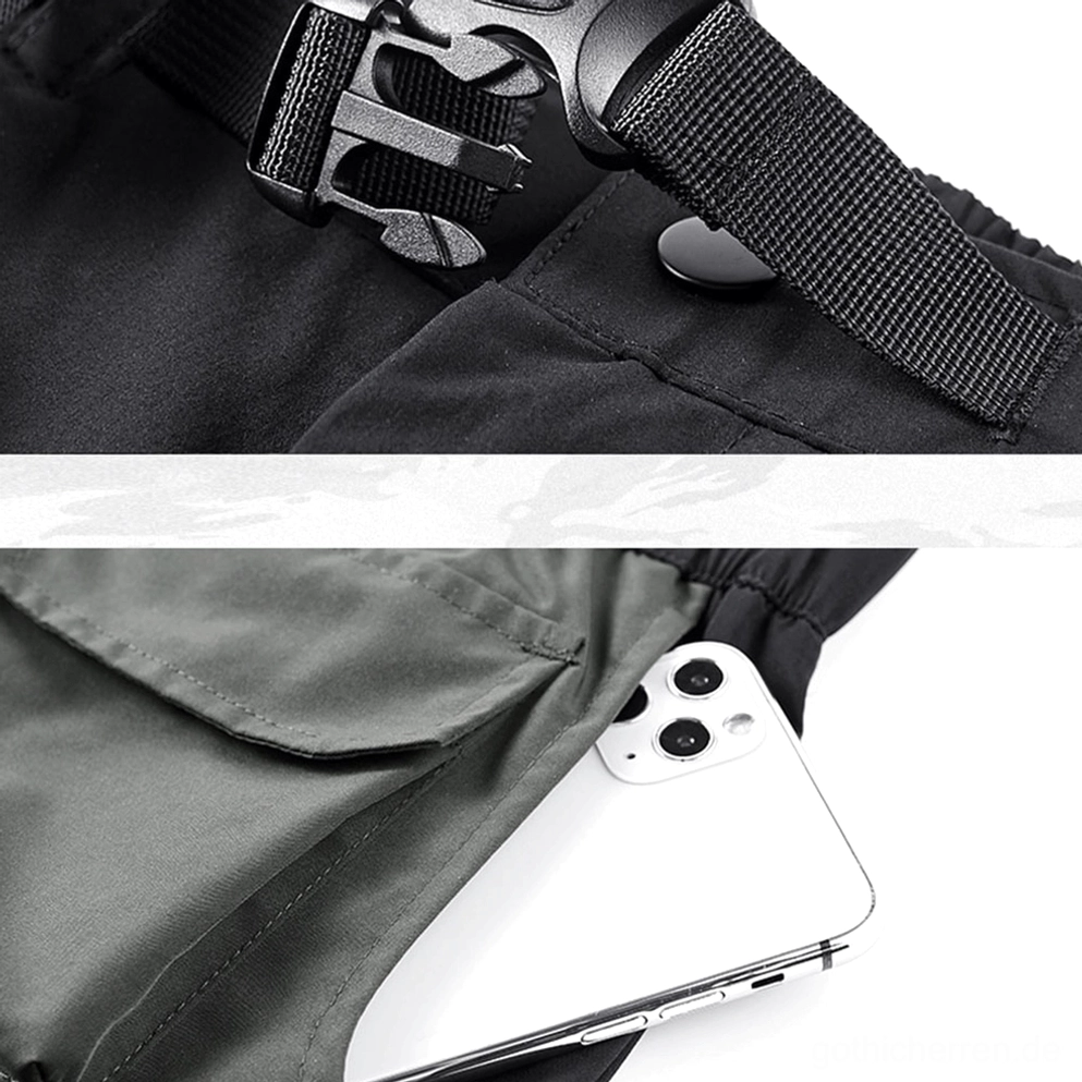 Tailles-Schnallen und Webbing-Riemen Nahaufnahme mit Quick-Release-Kunststoff-Hardware auf schwarzen Cargo Shorts