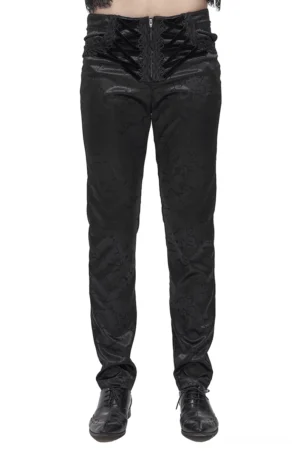 Schwarze Gothic-Cargohose mit Schnürung Vorderansicht – hochgeschnittene Silhouette mit ornamentaler Jacquard-Musterung und samtiger Schnürverschluss-Taille an männlichem Modell