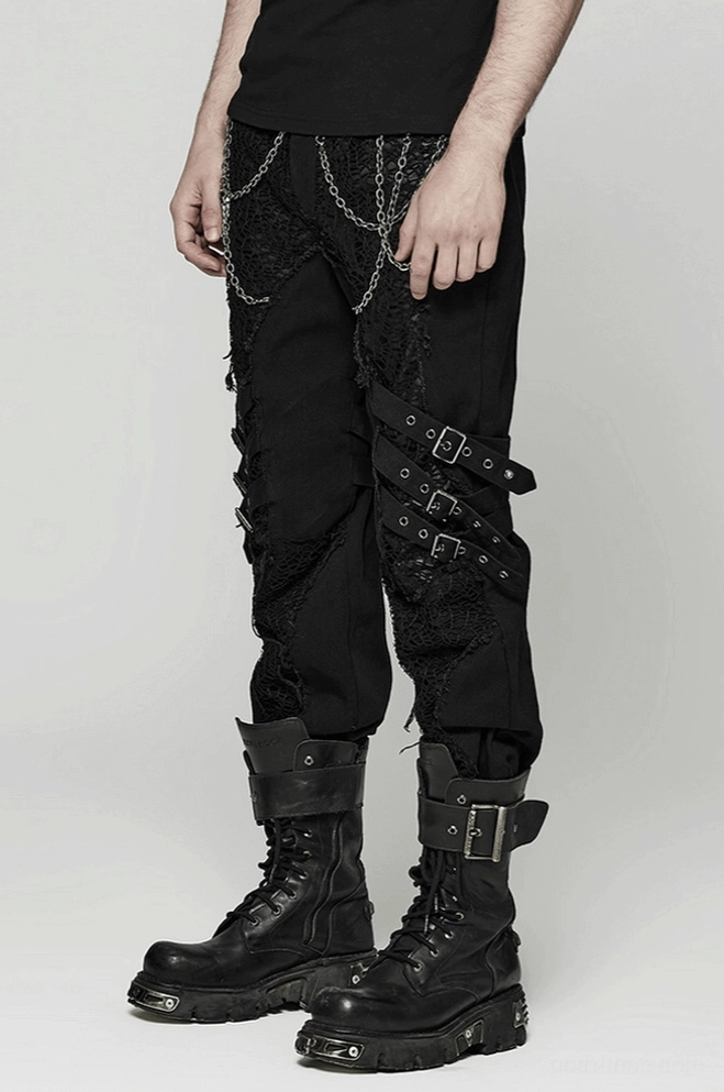 Schwarze Gothic Slim-Fit Röhrenhose mit segmentiertem Kniebereich, Mesh-Spitzeneinsätzen und abstraktem knochenhaftem Segmentierungsmuster als Designdetail