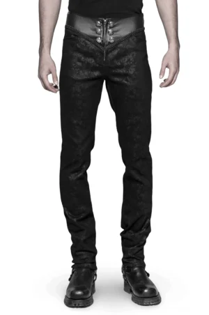 Schwarze Gothic-Schnür-Skinny Jeans mit gestepptem Leder-Taillenband – Vorderansicht auf männlichem Modell zeigt skulpturierte High-Waist-Silhouette, floral geprägte Denim-Textur, zierliche Metallknöpfe und schlanke Alternative-Fashion-Passform