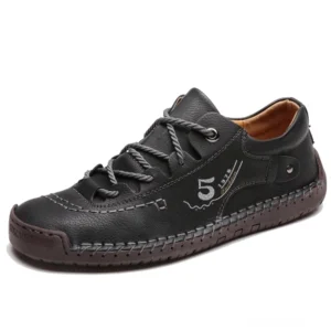 Schwarze Gothic Schnürschuhe Herren Leder-Loafer, Vorder-Dreiviertel-Ansicht mit handgesteppten Details und Premium-Leder-Konstruktion