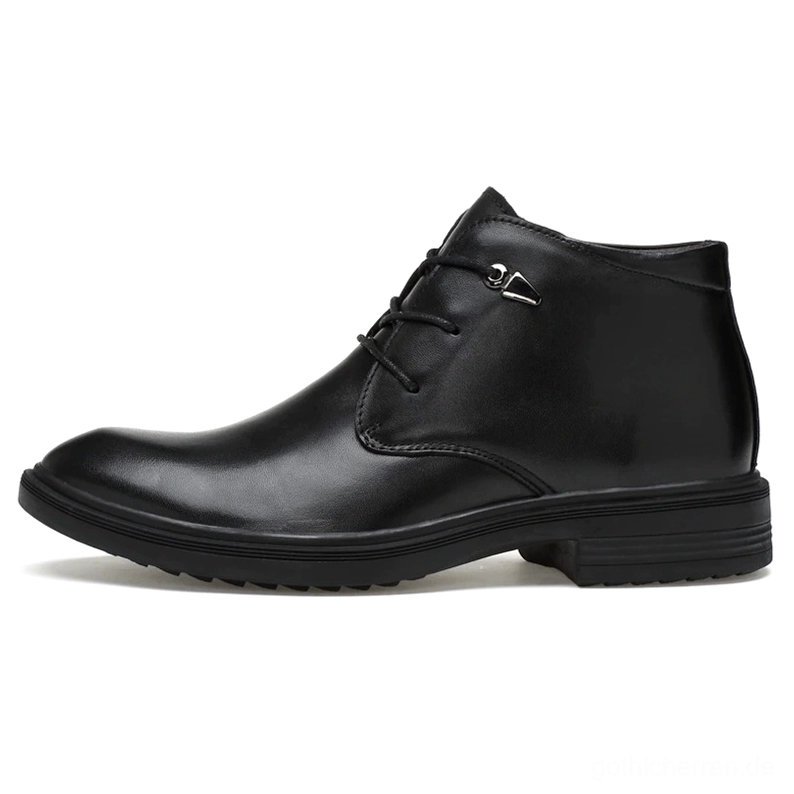 Schwarze Gothic Stiefel Krokodilmuster Leder Nahaufnahme geprägte Oberflächenstruktur Texturdetail