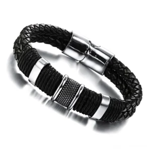 Draufsicht auf schwarzes Leder-Seilgeflecht-Armband mit poliertem Edelstahl-Toggle-Verschluss Detail, Overhead-Aufnahme zeigt Verschlussmechanismus