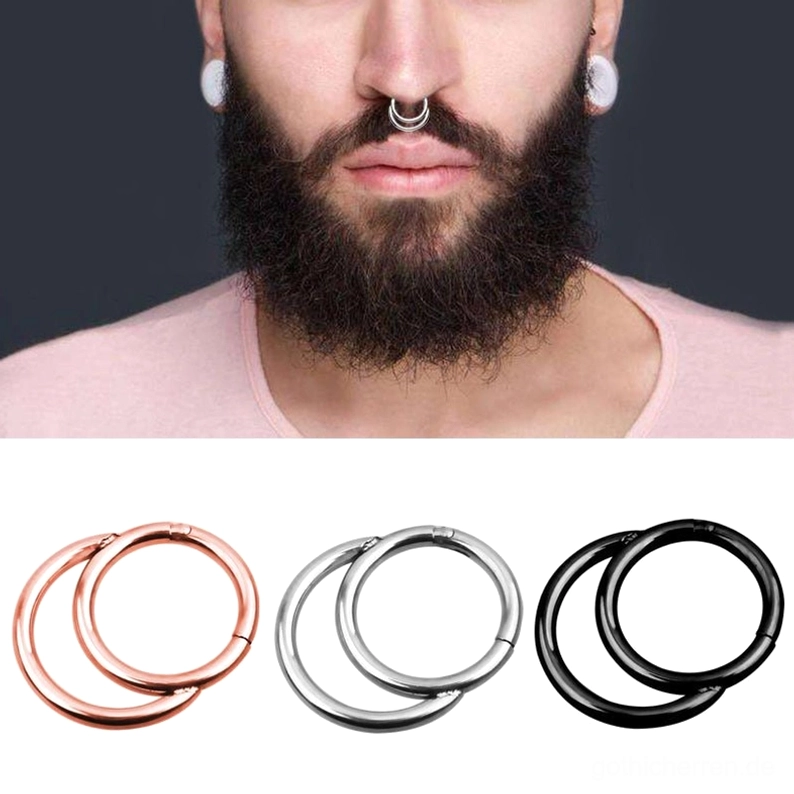 Mann trägt silbernen Hinged Segment Clicker Ring – Frontalansicht mit gotischem Stil-Ästhetik und Trageeffekt im Portrait